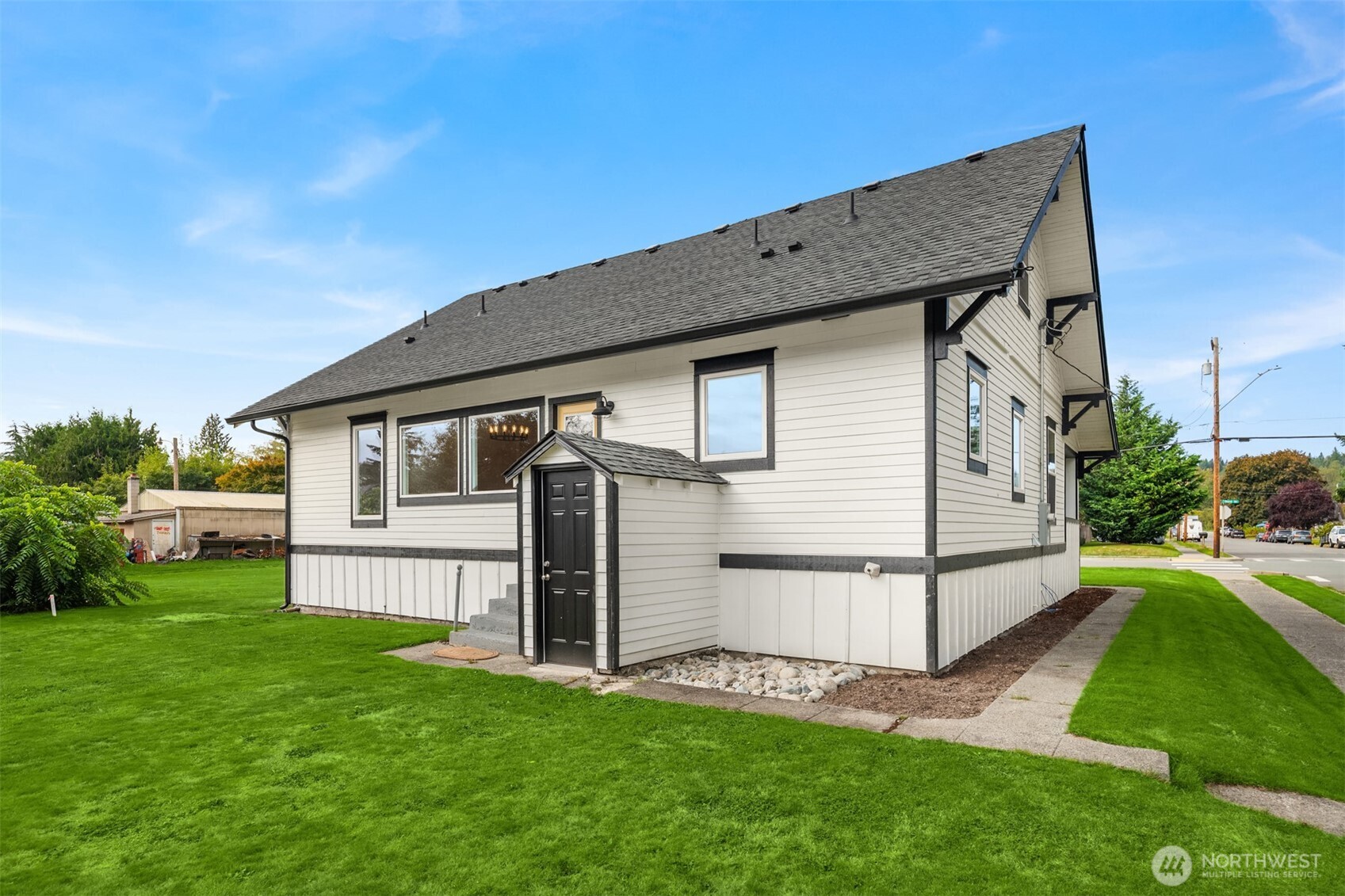306 3rd Street Sultan, WA 98294 - Photo 24 of 40 a view of backyard with a garden and deck