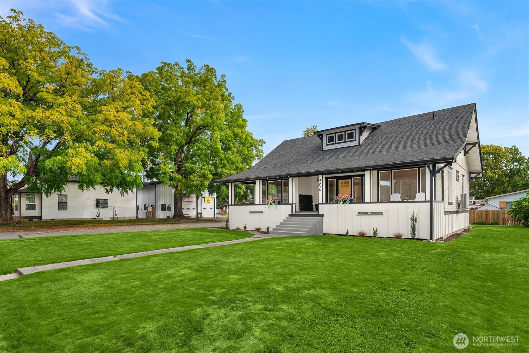 306 3rd Street Sultan, WA 98294 - Photo 28 of 40 a front view of a house with a yard and trees