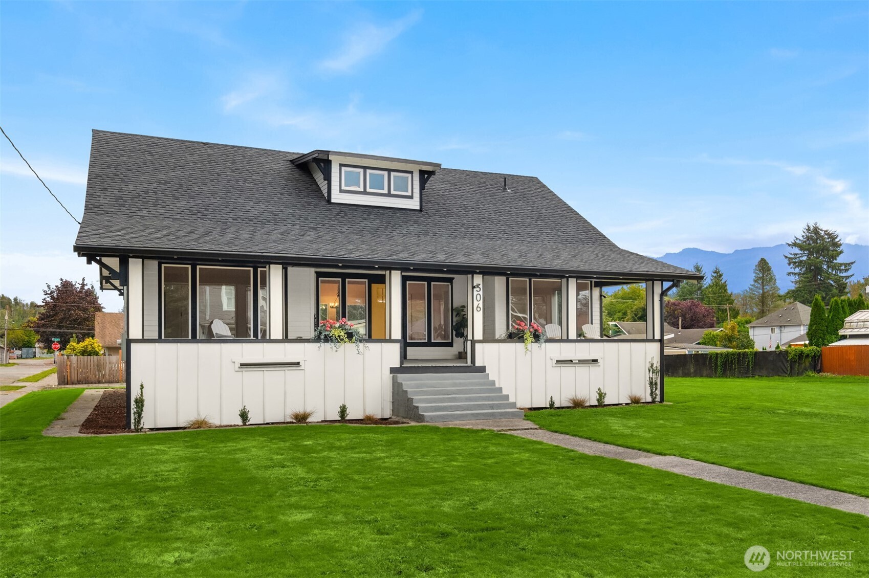 306 3rd Street Sultan, WA 98294 - Photo 37 of 40 a front view of a house with a yard