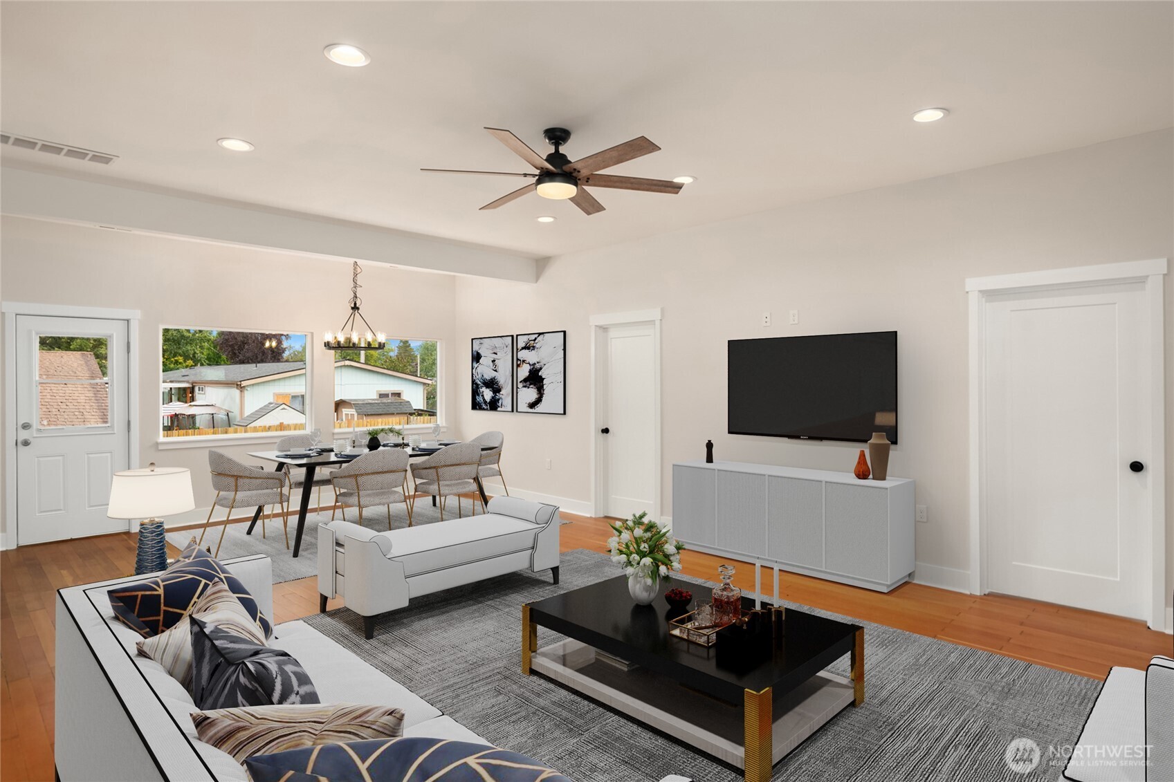 306 3rd Street Sultan, WA 98294 - Photo 6 of 40 a living room with furniture ceiling fan and a flat screen tv