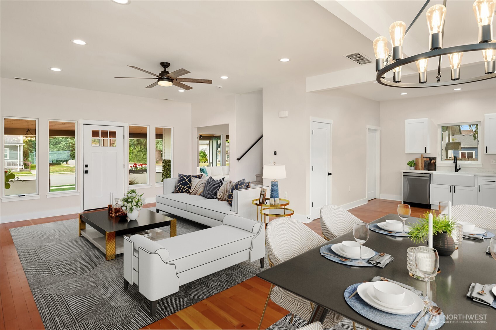 306 3rd Street Sultan, WA 98294 - Photo 7 of 40 a living room with furniture a chandelier and a table