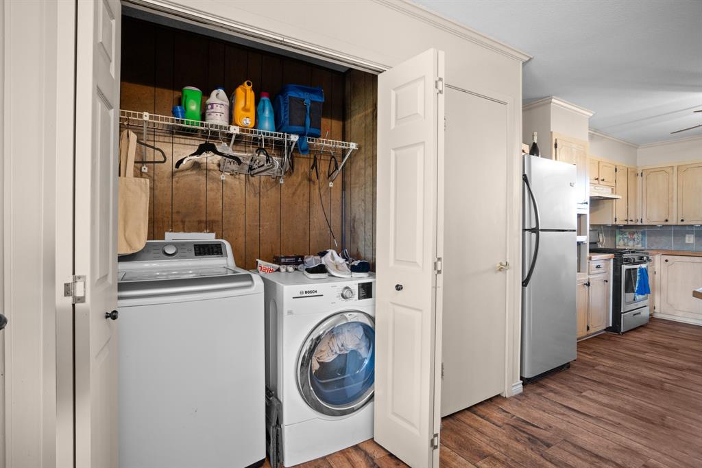 101 Taylor Street Como, TX 75431 - Photo 12 of 39 a view of a kitchen with washer and dryer