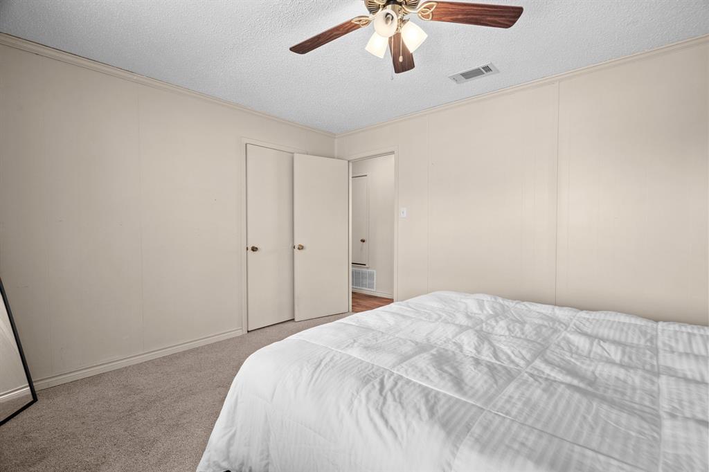 101 Taylor Street Como, TX 75431 - Photo 20 of 39 a view of a livingroom with a white walls