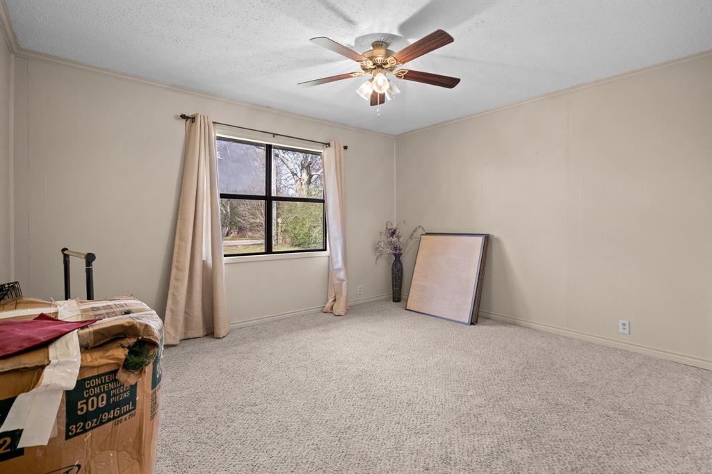 101 Taylor Street Como, TX 75431 - Photo 22 of 39 a view of a livingroom with a workspace