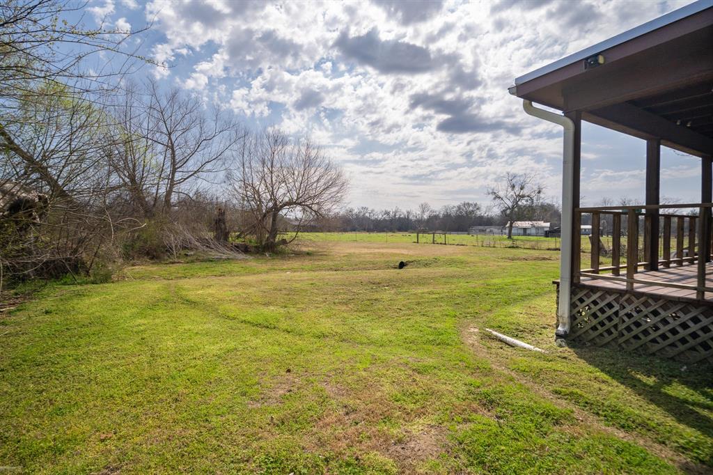 101 Taylor Street Como, TX 75431 - Photo 28 of 39 a view of yard with swimming pool and seating