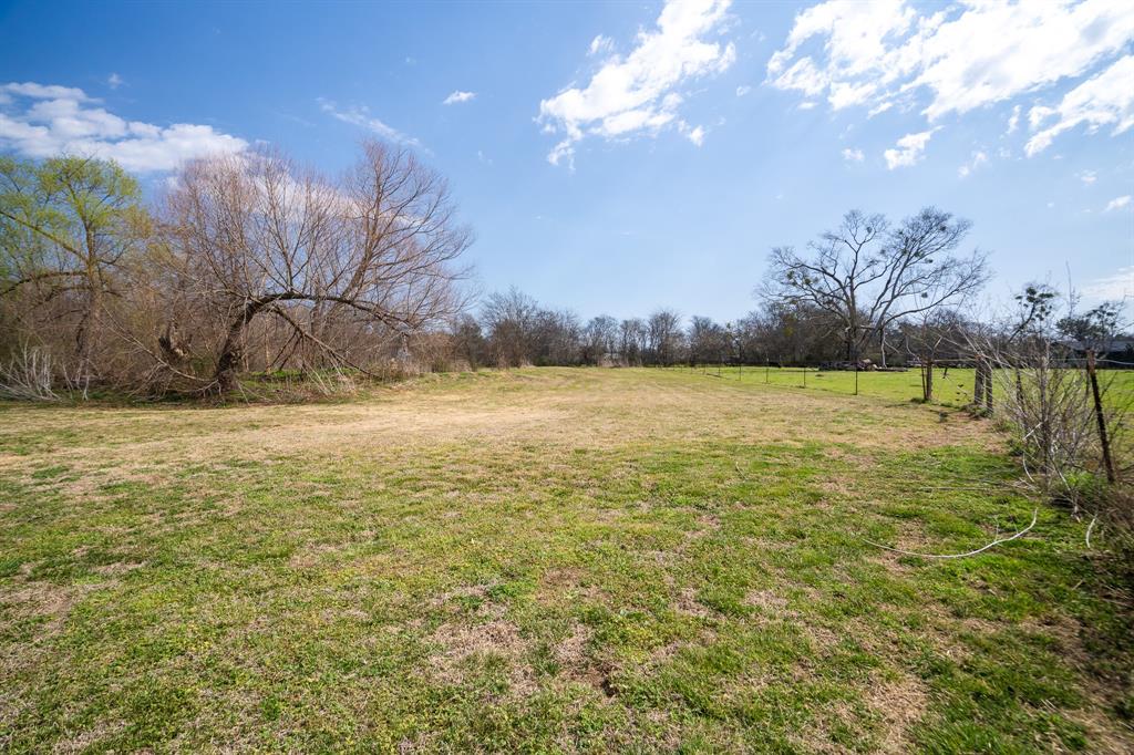 101 Taylor Street Como, TX 75431 - Photo 31 of 39 a view of a lake with a yard