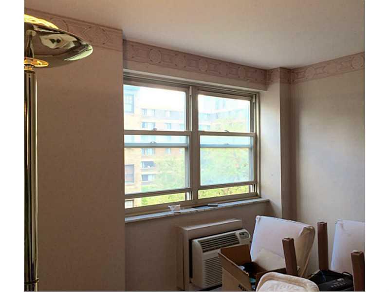 144 North Dithridge Street, Unit 414 Pittsburgh, PA 15213 - Photo 3 of 5 a view of a livingroom with furniture and windows