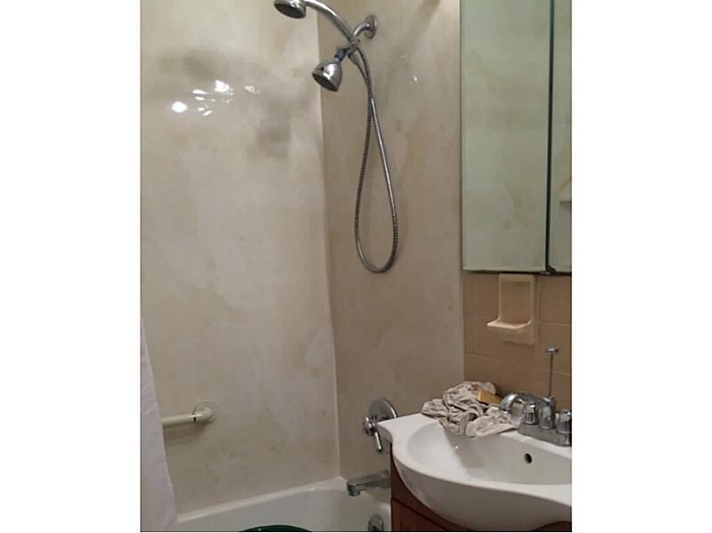 144 North Dithridge Street, Unit 414 Pittsburgh, PA 15213 - Photo 5 of 5 a bathroom with a sink a toilet and shower