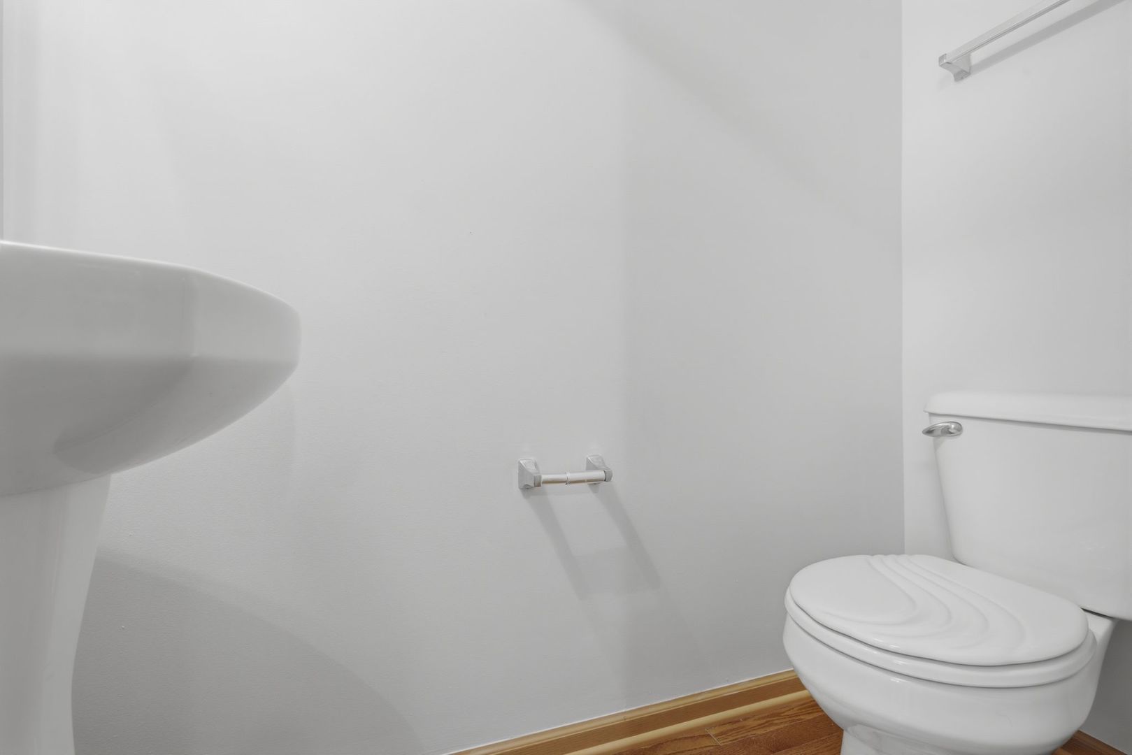 1758 Edith Lane Aurora, IL 60504 - Photo 18 of 28 a bathroom with a toilet and a sink