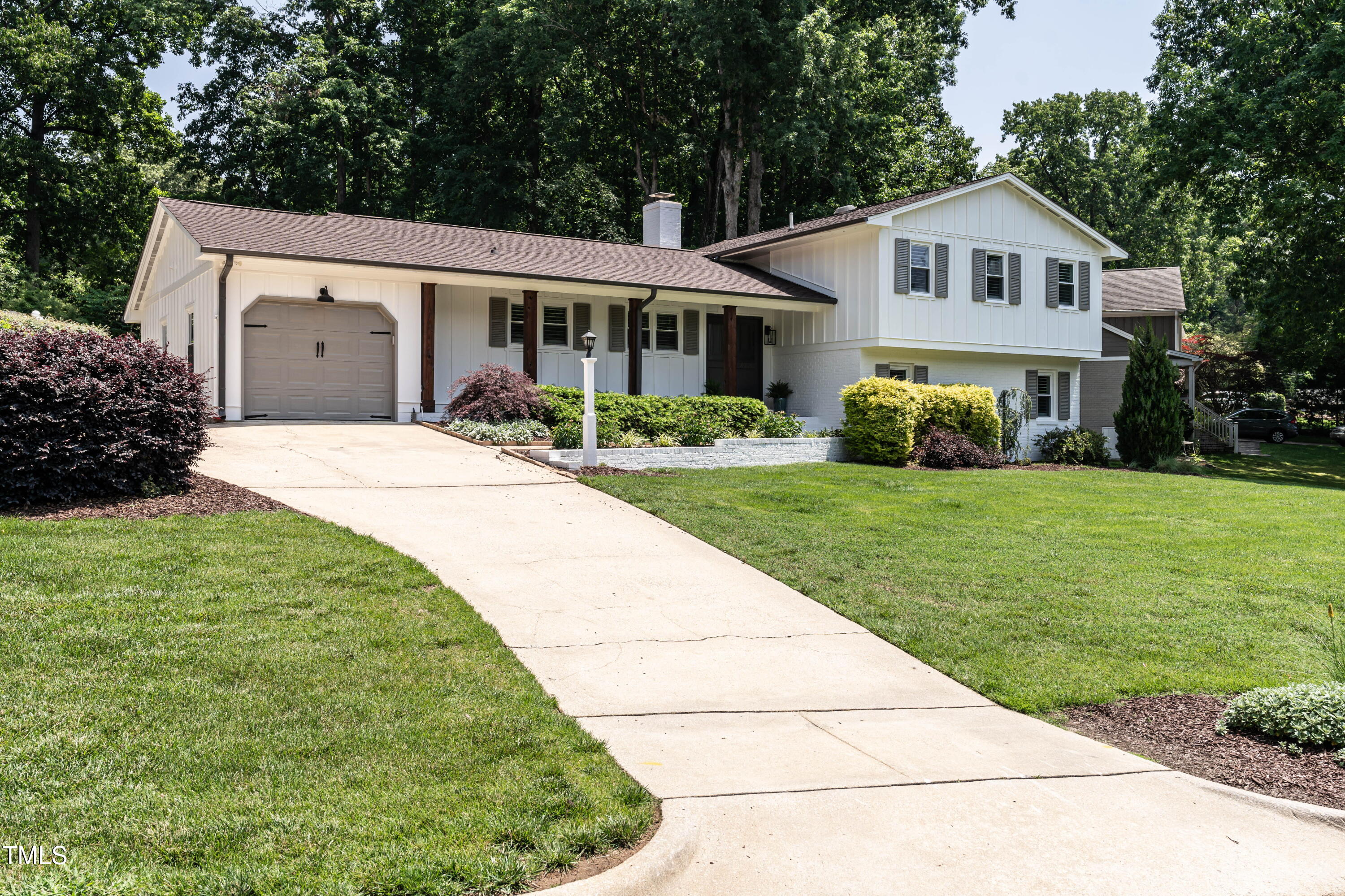 813 Faulkner Place Raleigh, NC 27609 - Photo 2 of 42 Expansive, play-worthy front yard