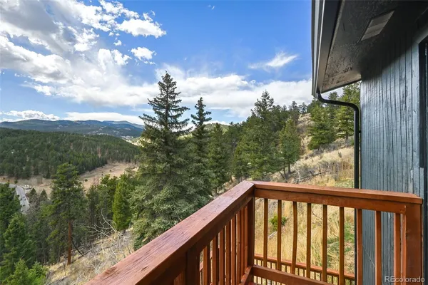 a view of a balcony with an outdoor space