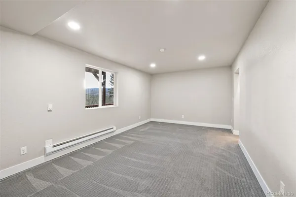 an empty room with windows