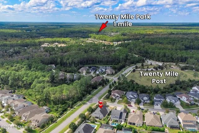 a view of a chairs and table in patio