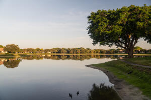 a view of a lake with houses with outdoor space
