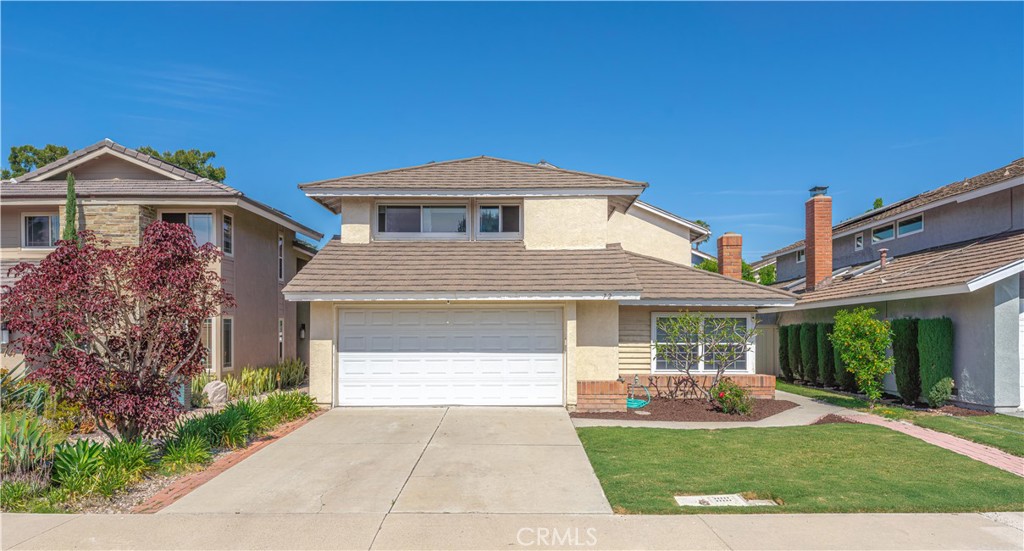72 Bluejay Irvine, CA 92604 - Photo 2 of 46 a front view of a house with a yard