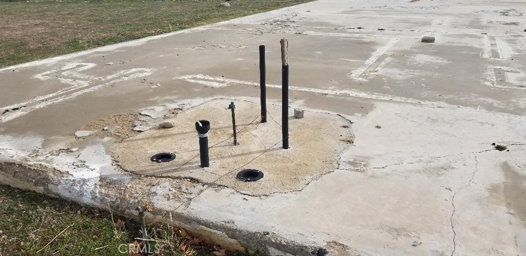 15120 Main Street Hesperia, CA 92345 - Photo 12 of 12 a view of water heater with wooden floor