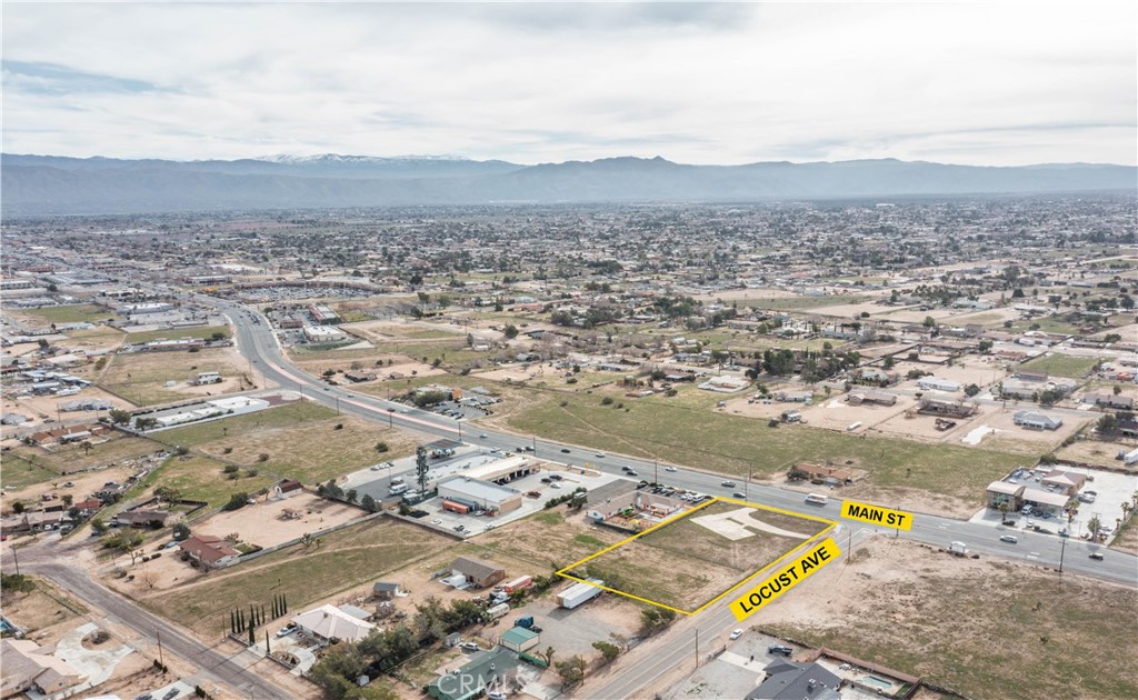 15120 Main Street Hesperia, CA 92345 - Photo 2 of 12 an aerial view of a city
