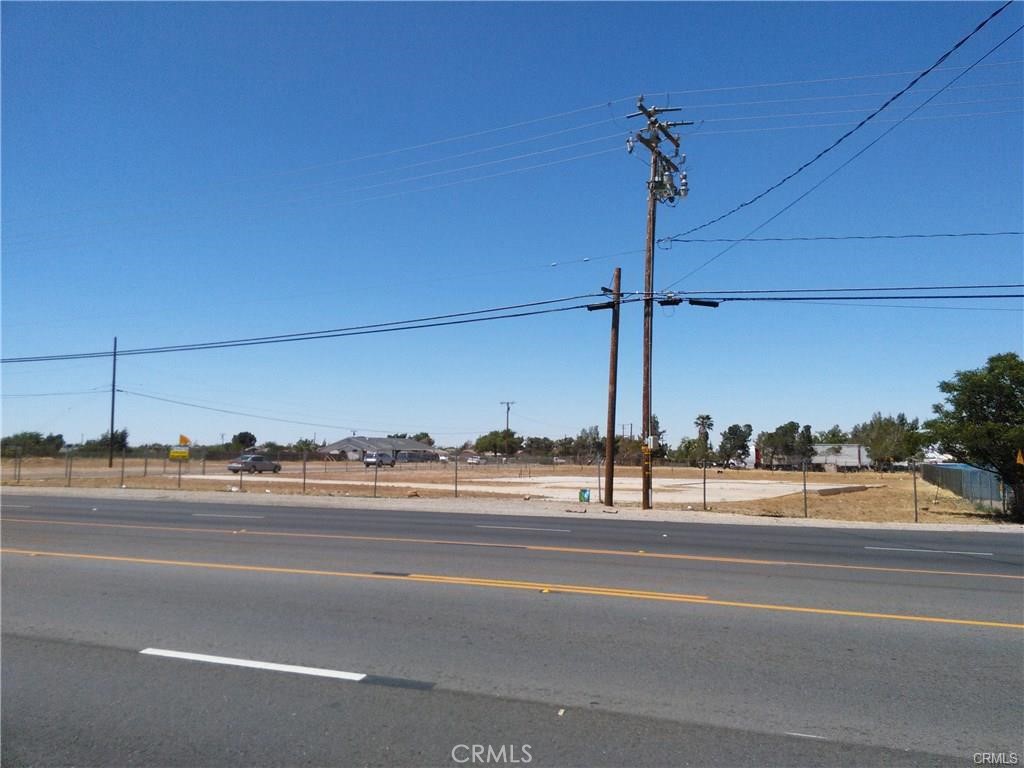 15120 Main Street Hesperia, CA 92345 - Photo 5 of 12 a view of a tall building next to a road