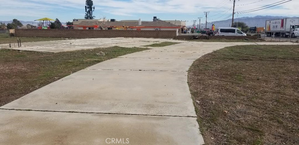 15120 Main Street Hesperia, CA 92345 - Photo 10 of 12 a view of a road with an ocean view
