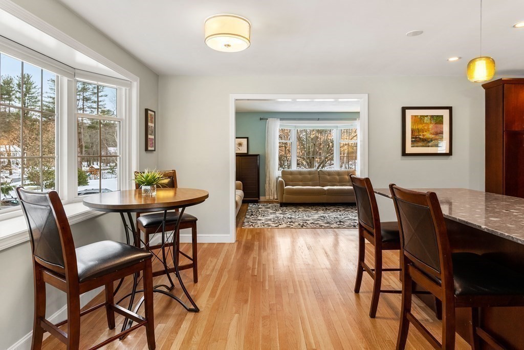 72 Austin Road Sudbury, MA 01776 - Photo 8 of 36 a view of a dining room with furniture and wooden floor