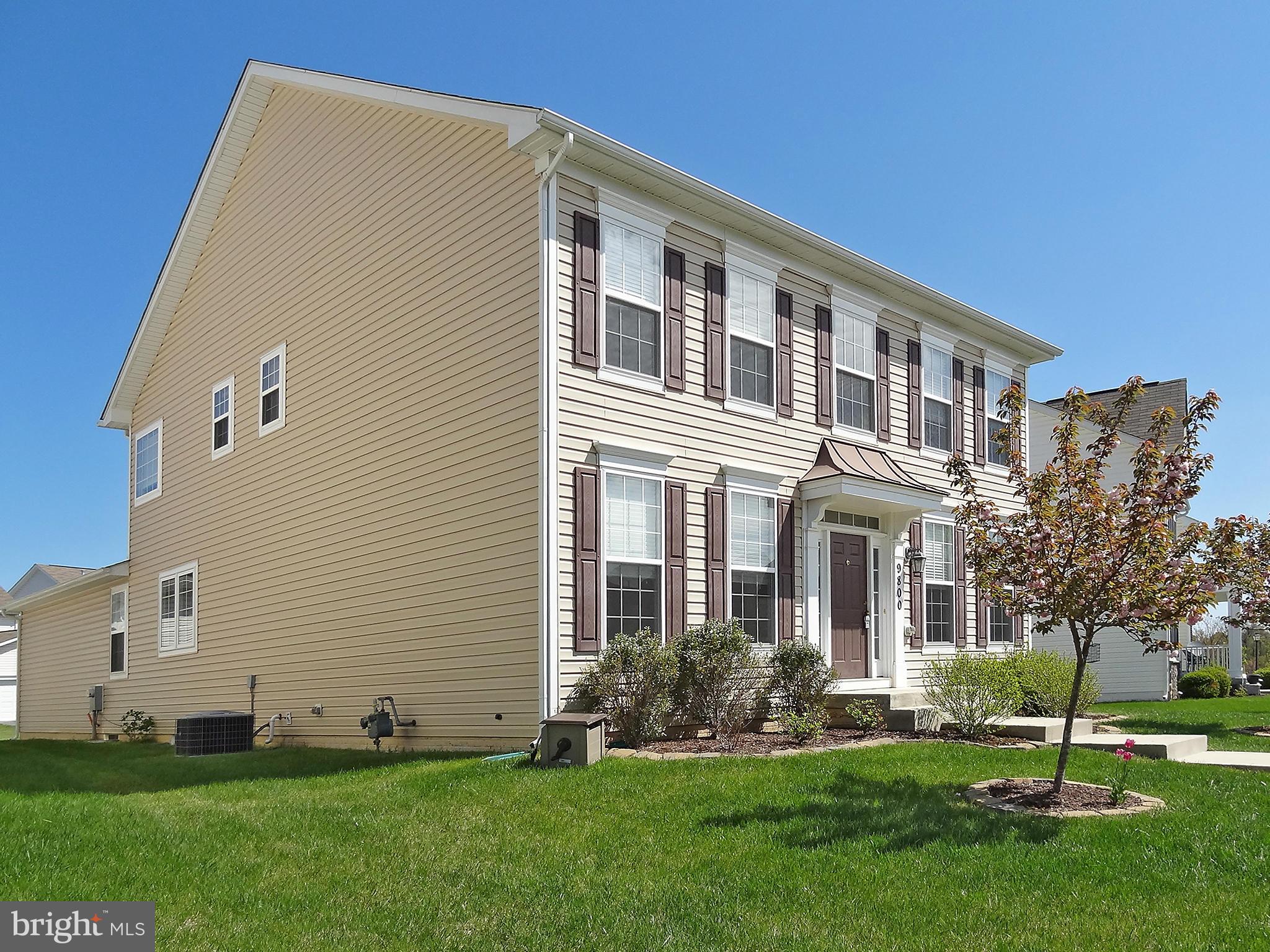 9800 Traver Street Bowie, MD 20721 - Photo 2 of 30 a front view of a house with a yard