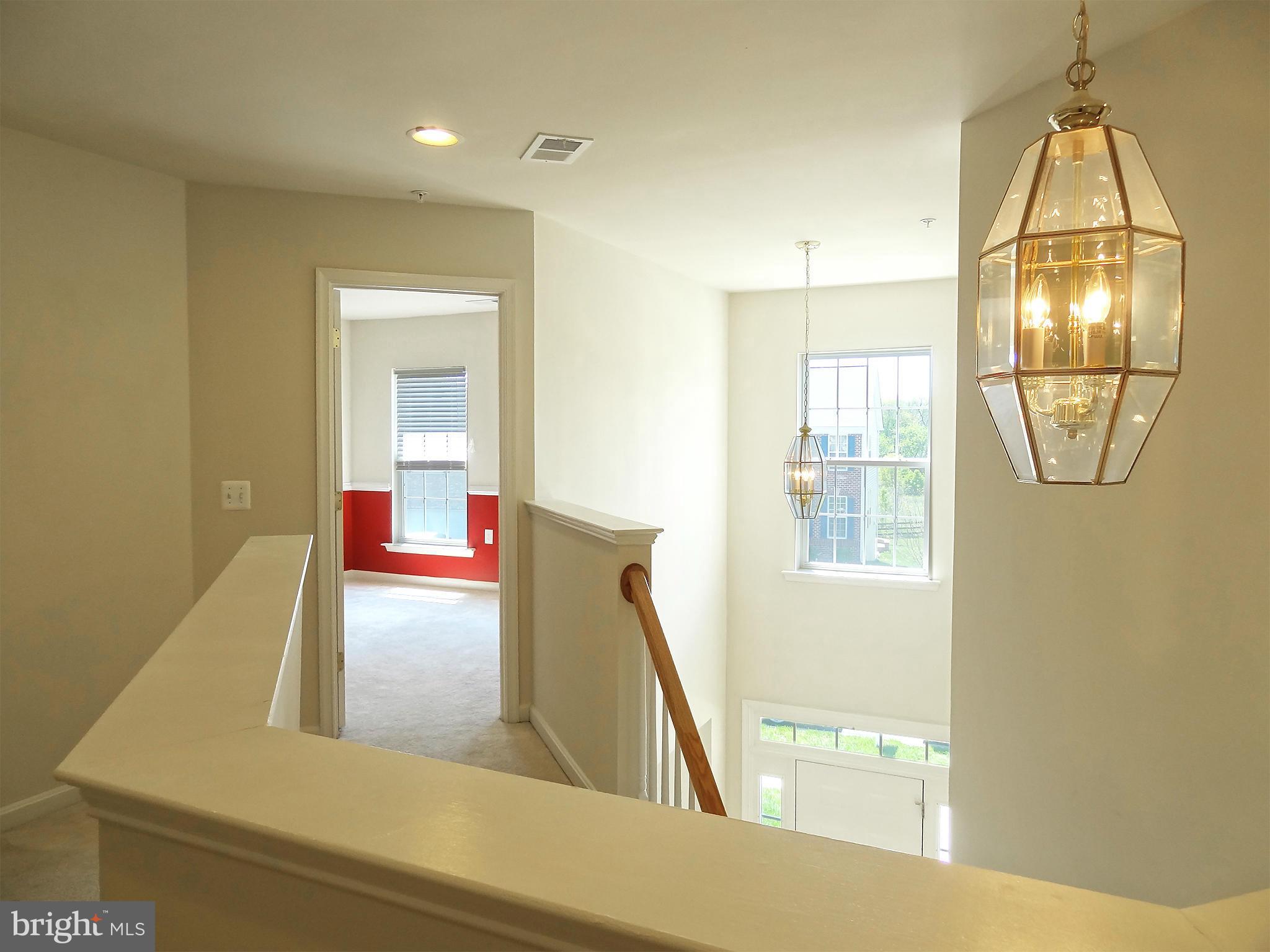 9800 Traver Street Bowie, MD 20721 - Photo 23 of 30 a view of a living room and a bathroom