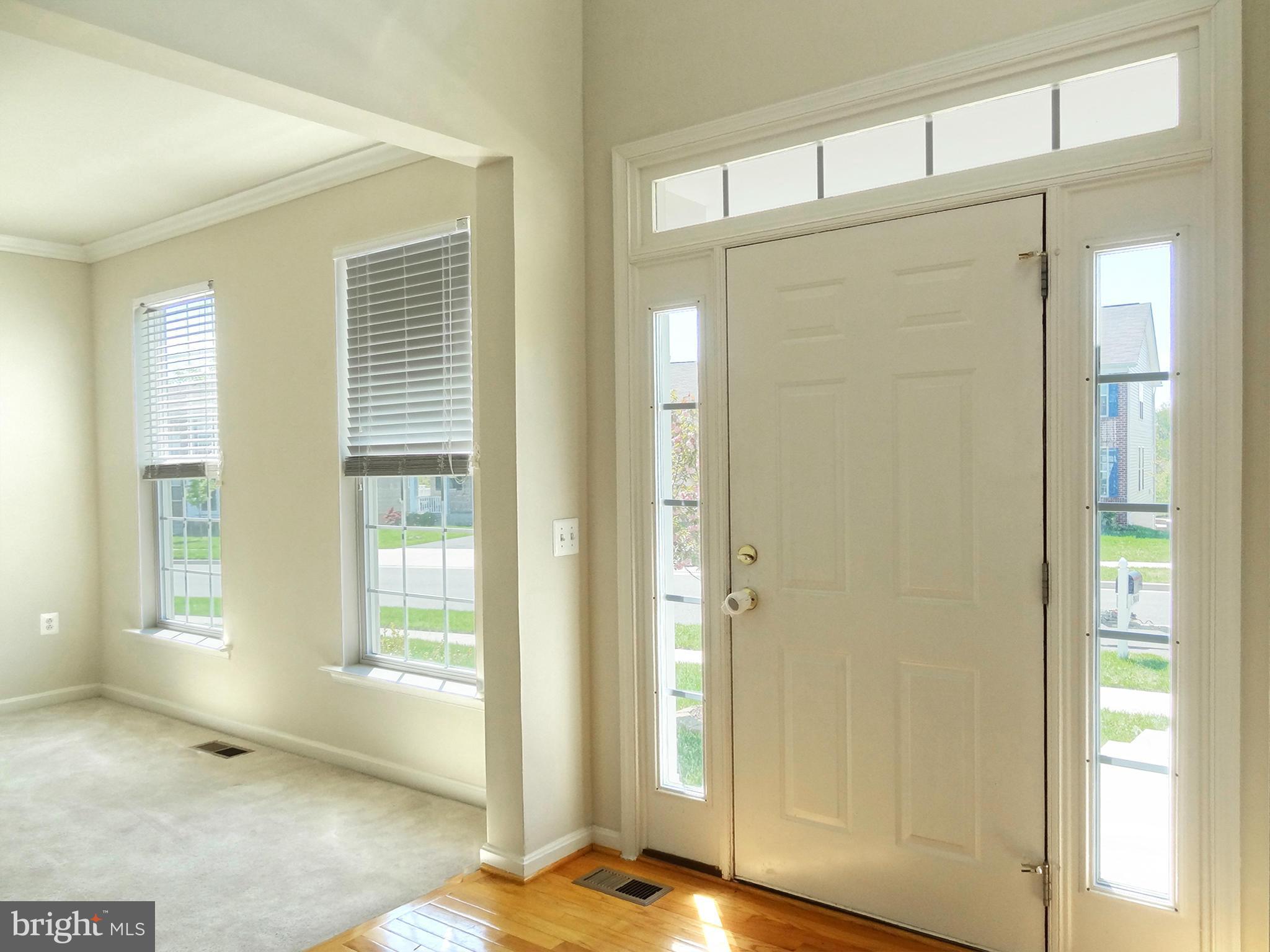9800 Traver Street Bowie, MD 20721 - Photo 4 of 30 a view of a bathroom with a glass door