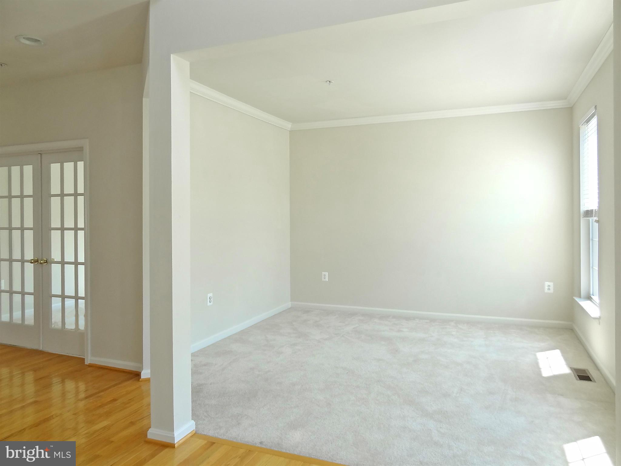 9800 Traver Street Bowie, MD 20721 - Photo 9 of 30 an empty room with windows