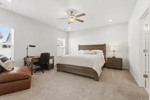 a bedroom with a bed and furniture