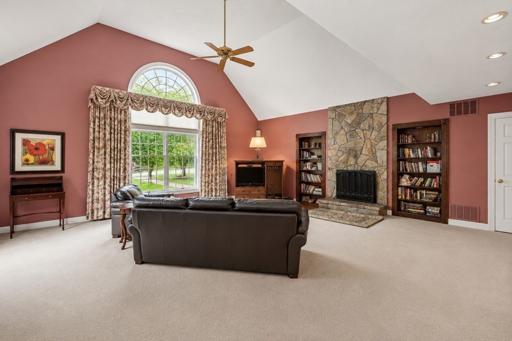 37 Old Planters Road Beverly, MA 01915 - Photo 21 of 42 a living room with furniture and a large window