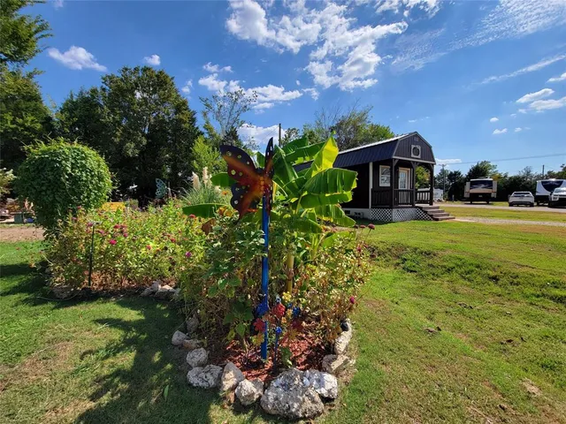 a view of a house with a big yard