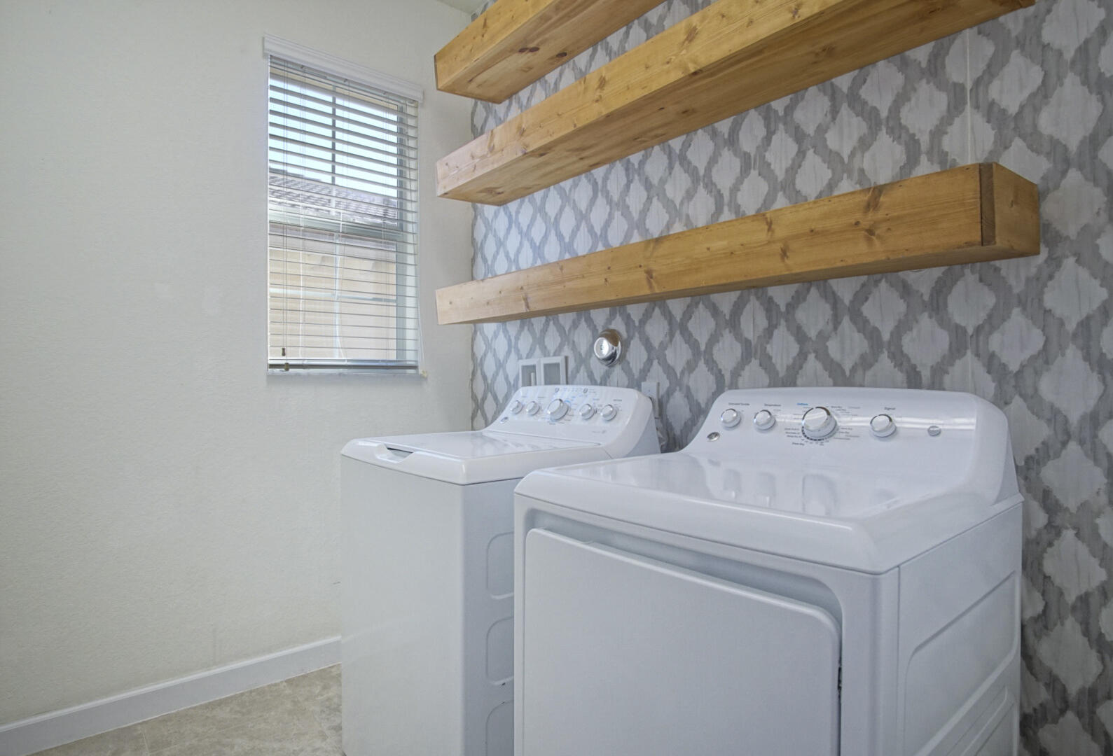9598 Southwest Purple Martin Way Stuart, FL 34997 - Photo 17 of 23 Laundry room
