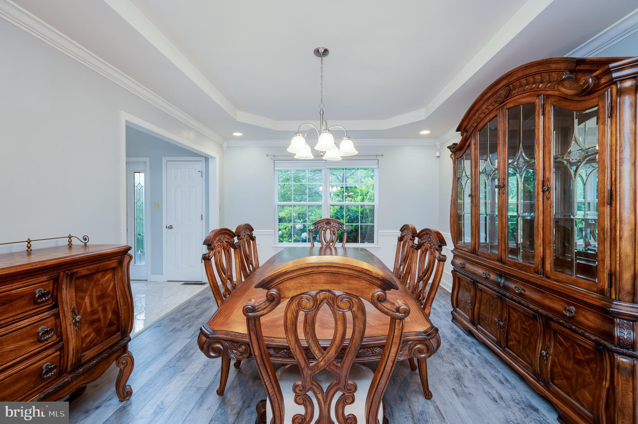 1013 Conifer Road Leesport, PA 19533 - Photo 11 of 102 a view of a dining room with furniture window and wooden floor