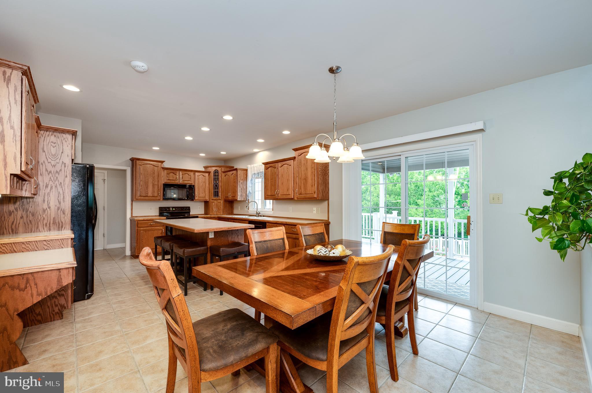 1013 Conifer Road Leesport, PA 19533 - Photo 21 of 102 a dining room with furniture and a large window
