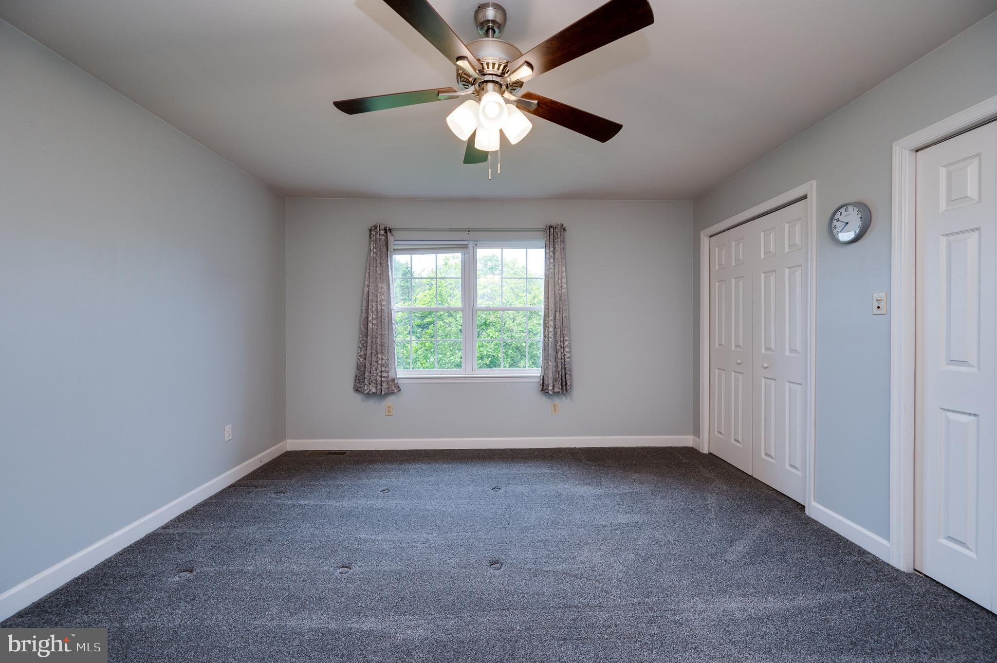 1013 Conifer Road Leesport, PA 19533 - Photo 42 of 102 an empty room with windows and fan