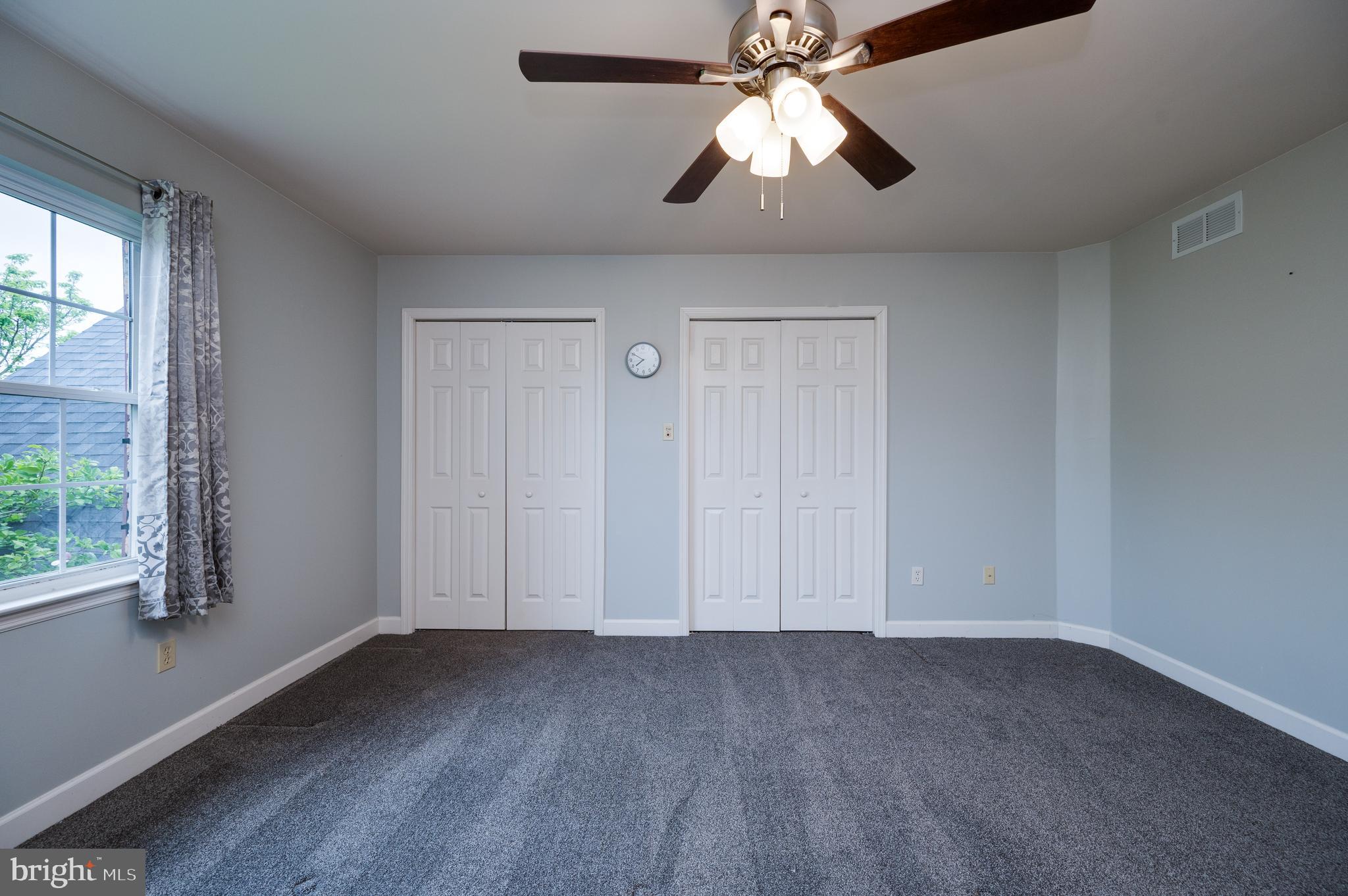1013 Conifer Road Leesport, PA 19533 - Photo 43 of 102 an empty room with windows and fan