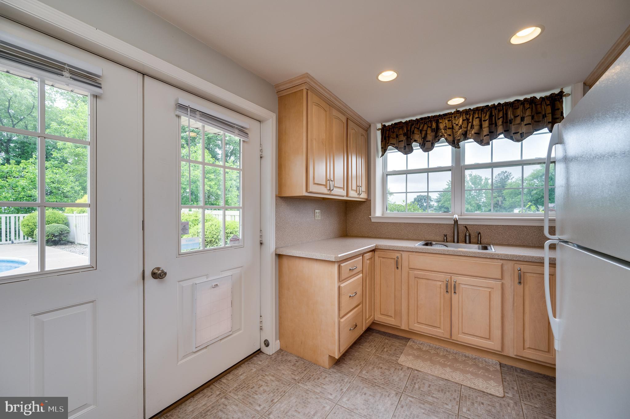 1013 Conifer Road Leesport, PA 19533 - Photo 67 of 102 a kitchen with a sink stove and cabinets
