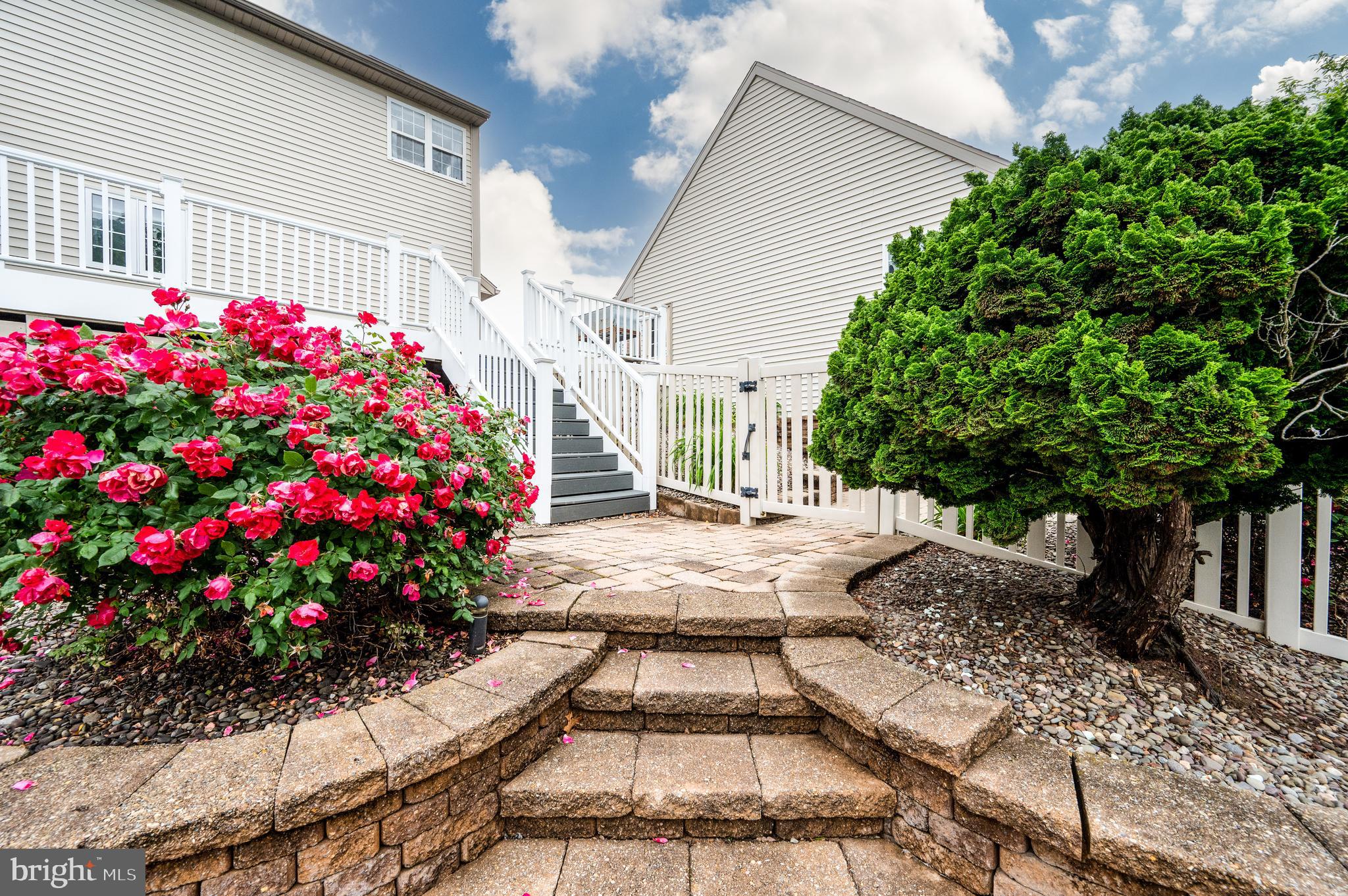 1013 Conifer Road Leesport, PA 19533 - Photo 79 of 102 a view of a house with a yard and flowers