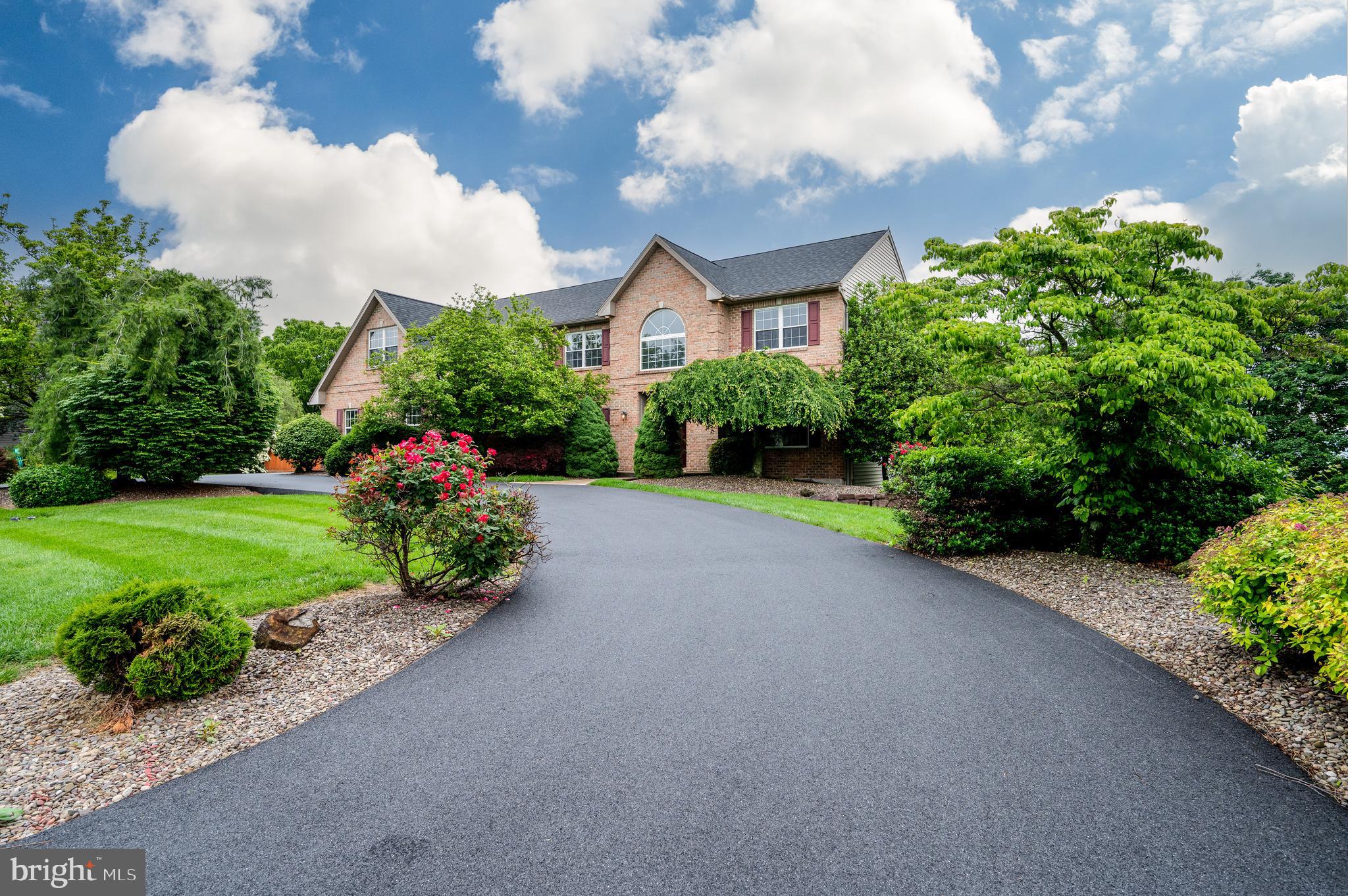1013 Conifer Road Leesport, PA 19533 - Photo 82 of 102 a front view of a house with a yard and outdoor seating