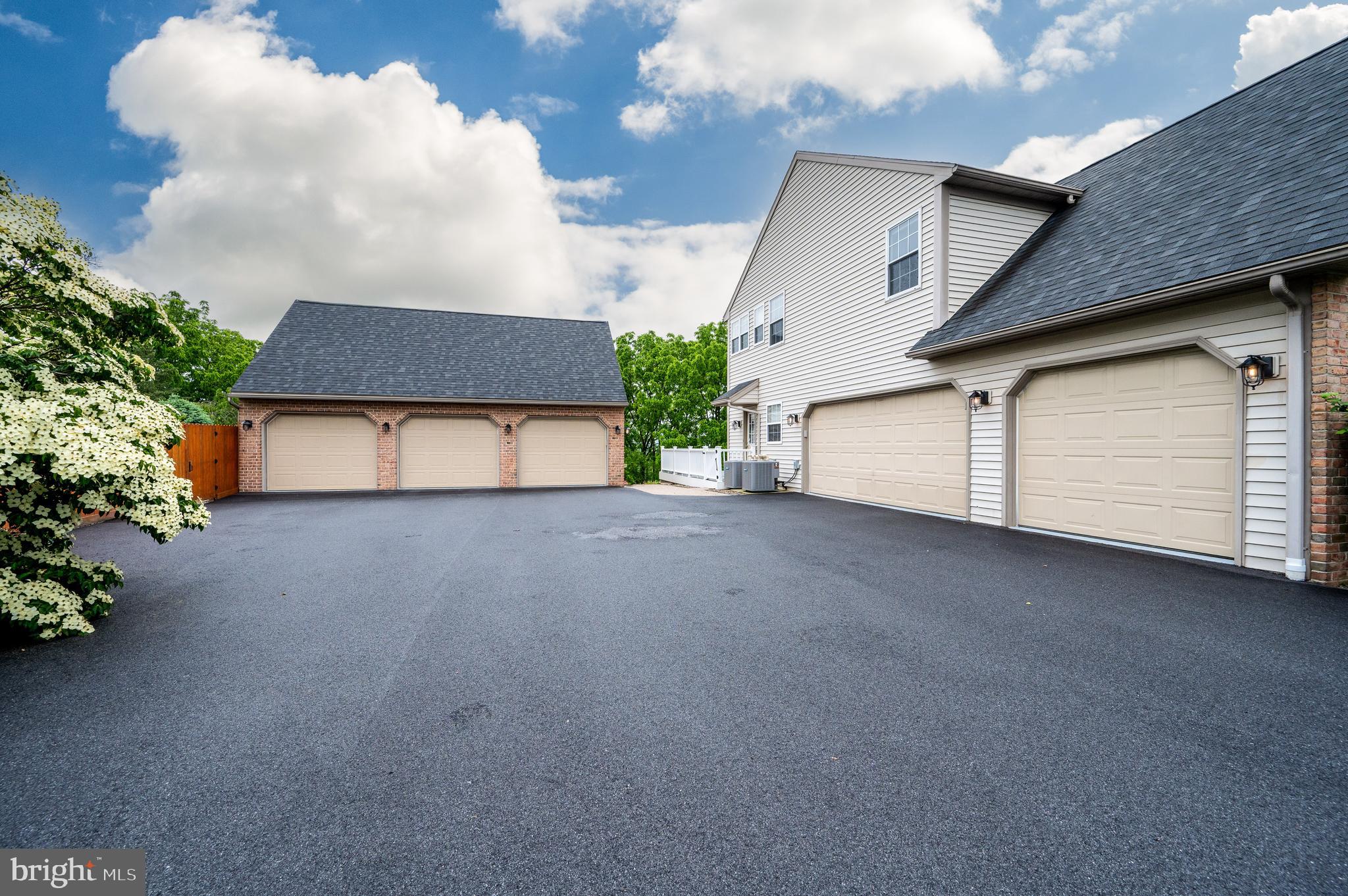 1013 Conifer Road Leesport, PA 19533 - Photo 86 of 102 a front view of a house with a garage