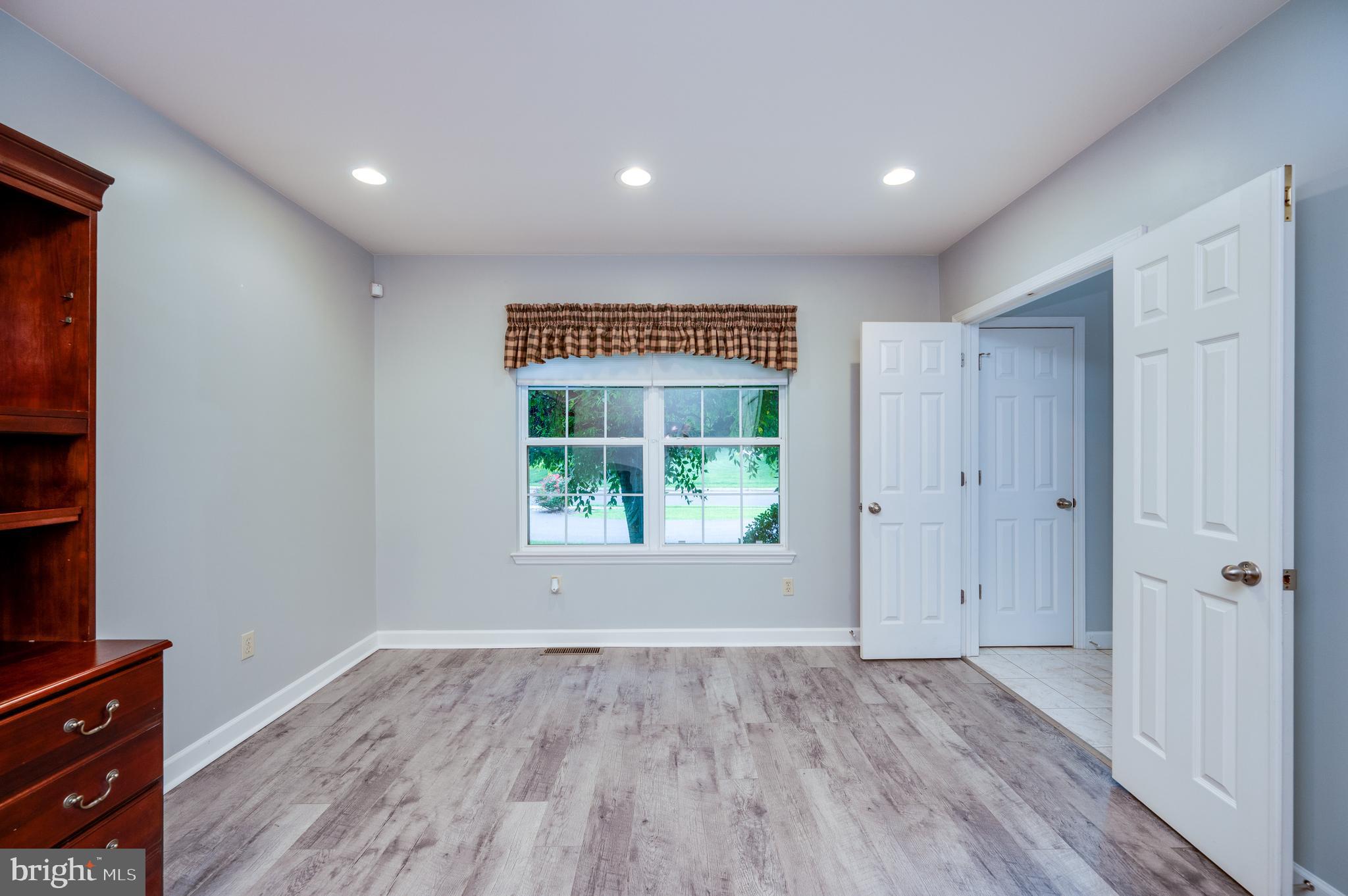 1013 Conifer Road Leesport, PA 19533 - Photo 9 of 102 wooden floor in an empty room with a window