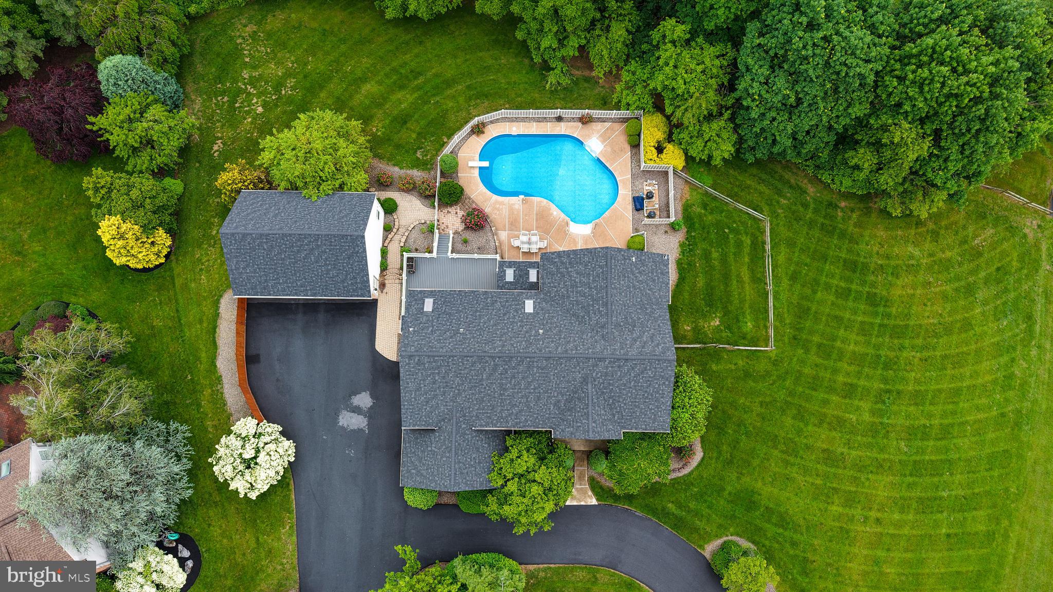 1013 Conifer Road Leesport, PA 19533 - Photo 96 of 102 an aerial view of a house with a swimming pool a yard and a outdoor seating
