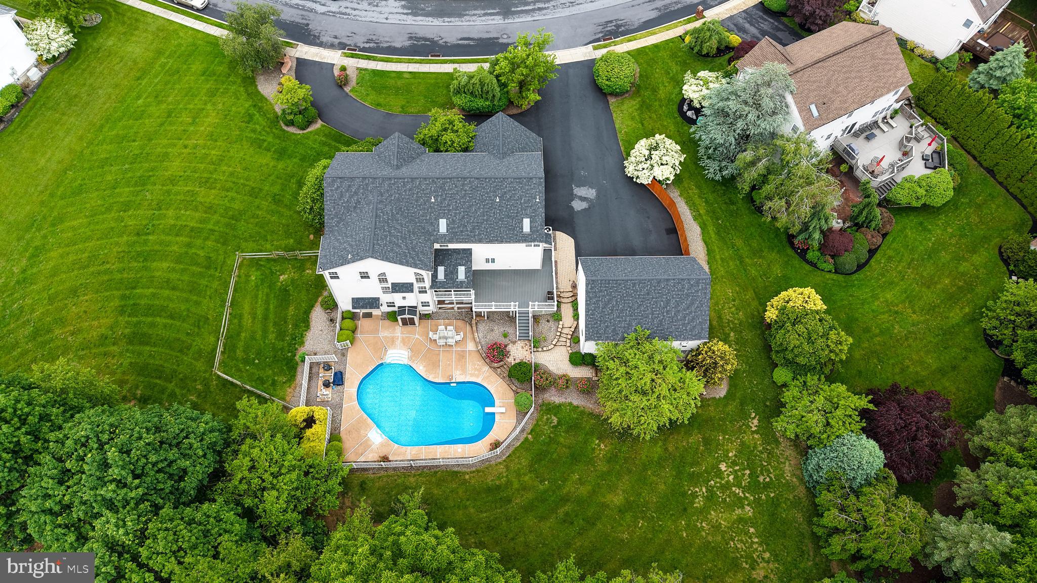 1013 Conifer Road Leesport, PA 19533 - Photo 97 of 102 an aerial view of a house with a swimming pool yard and outdoor seating