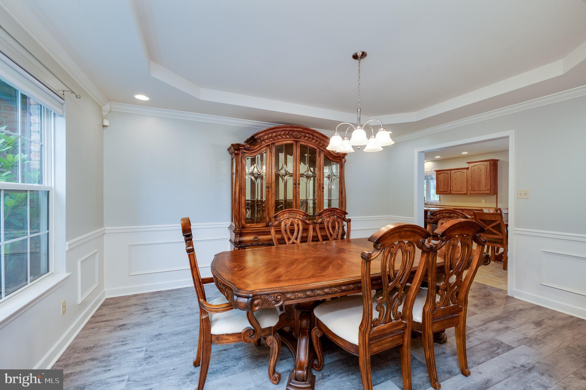 1013 Conifer Road Leesport, PA 19533 - Photo 10 of 102 a view of a dining room with furniture window and wooden floor