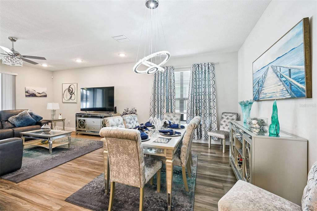 12627 Vander Way New Port Richey, FL 34654 - Photo 15 of 77 a living room with furniture and a flat screen tv