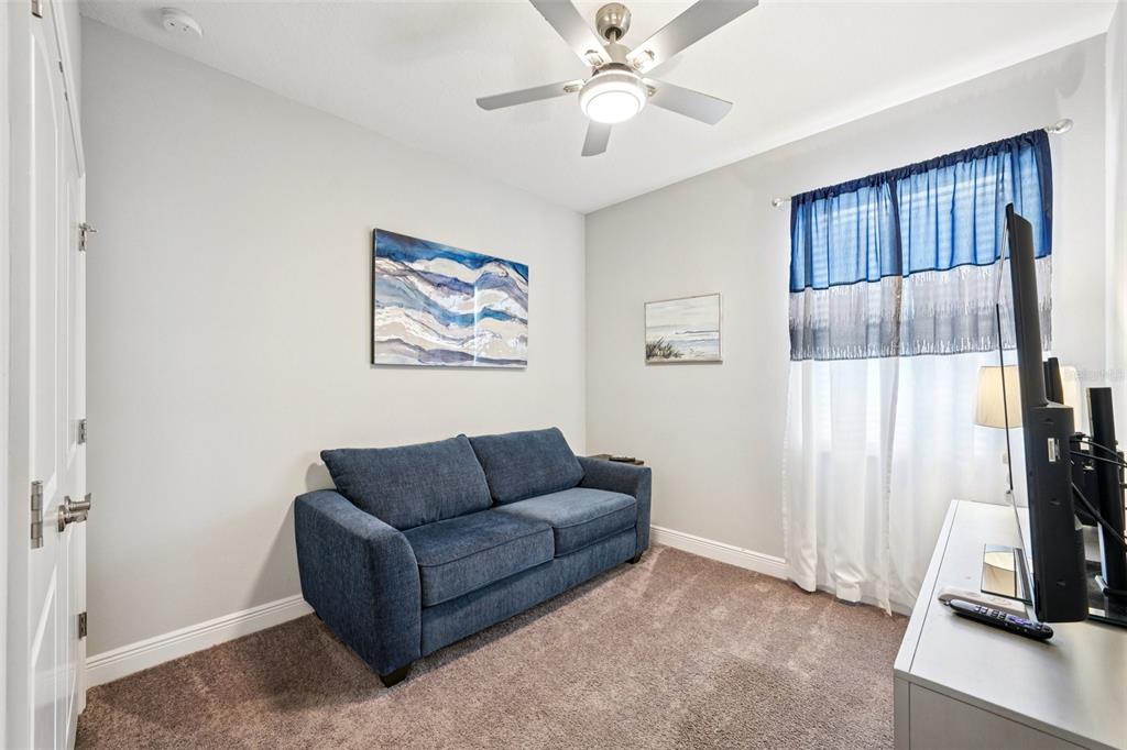12627 Vander Way New Port Richey, FL 34654 - Photo 34 of 77 a living room with furniture and a window