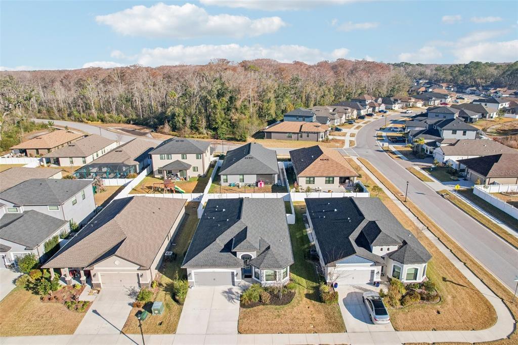 12627 Vander Way New Port Richey, FL 34654 - Photo 62 of 77 an aerial view of a house with a mountain