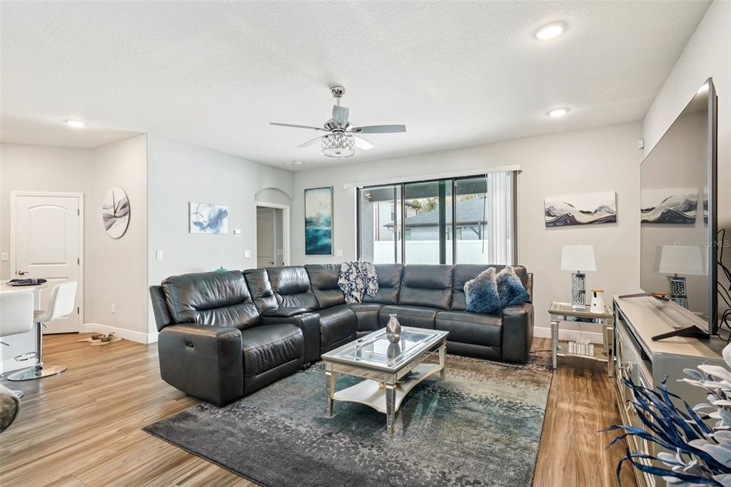 12627 Vander Way New Port Richey, FL 34654 - Photo 7 of 77 a living room with furniture