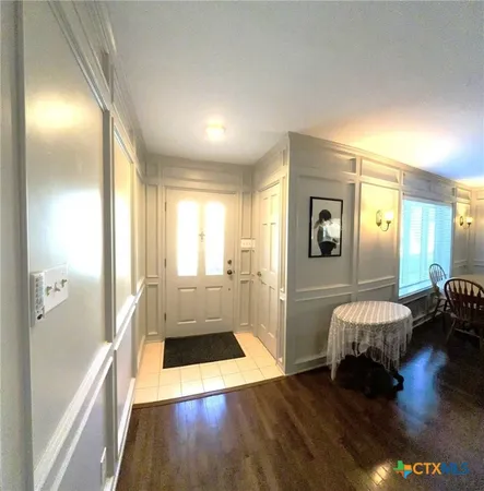 a living room with furniture or couch and a fireplace