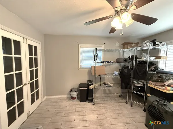 a view of a livingroom with a workspace